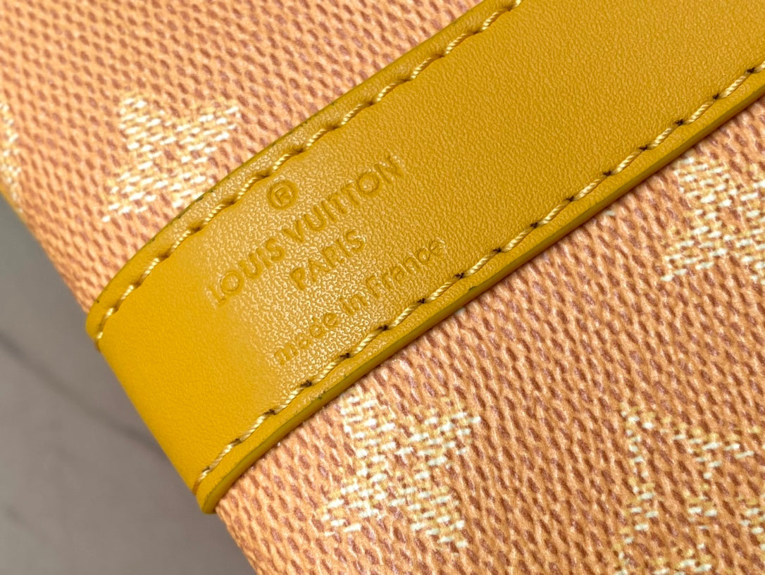 KEEPALL BANDOULI_RE 55 IN ORANGE MONOGRAM HERITAGE CANVAS