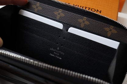 LV Dragonne Zipper Wallet Monogram Canvas & Cowhide 179407