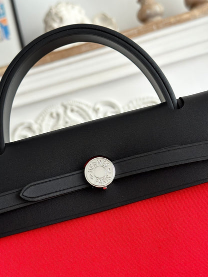 ZIP CABINE 31 BAG IN CLASSIC RED CANVAS AND BLACK CALFSKIN